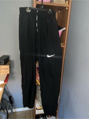 Nike Black Jogger Pants with White Swoosh Logo
